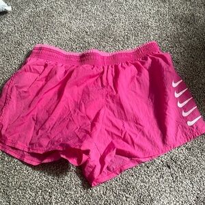 Pink Nike shorts